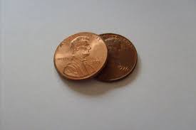 two pennies overlapping